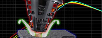 A subwoofer hovering over an enclosure that is too small for it